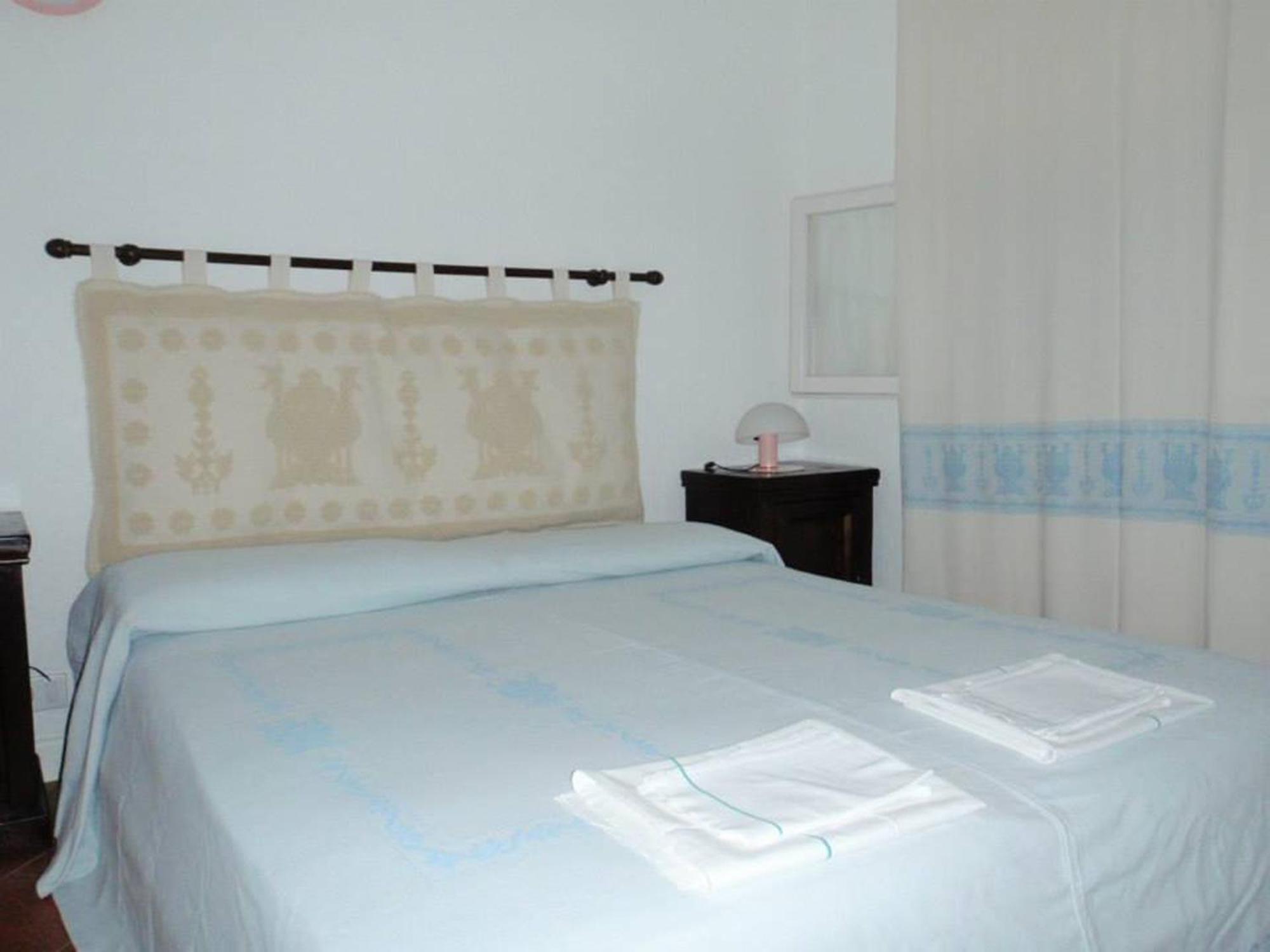 Rocca Ruja Vip Aparthotel Stintino Room photo